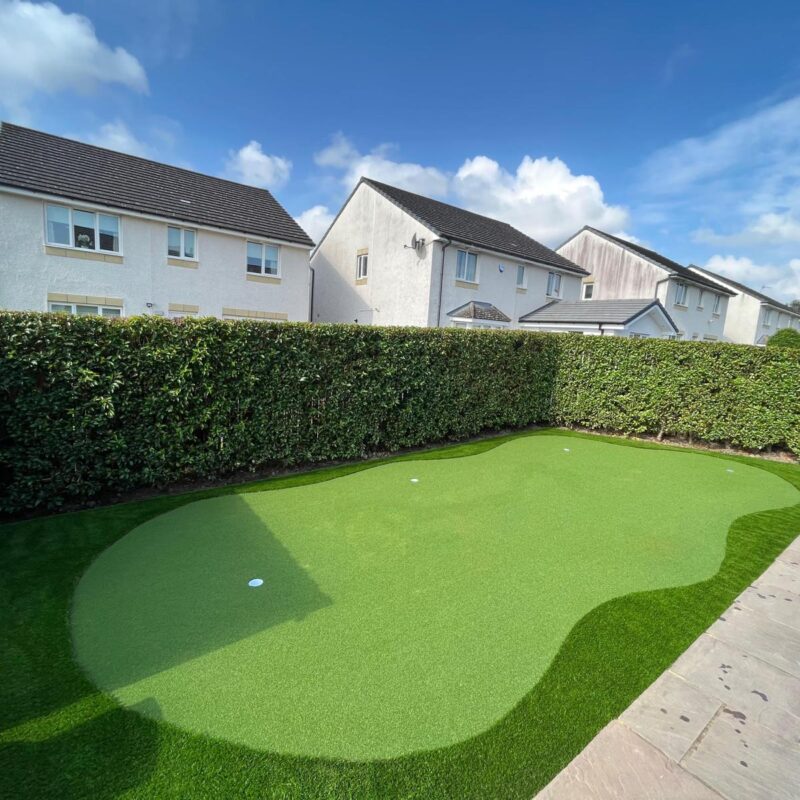 Artificial grass in back garden with golf area